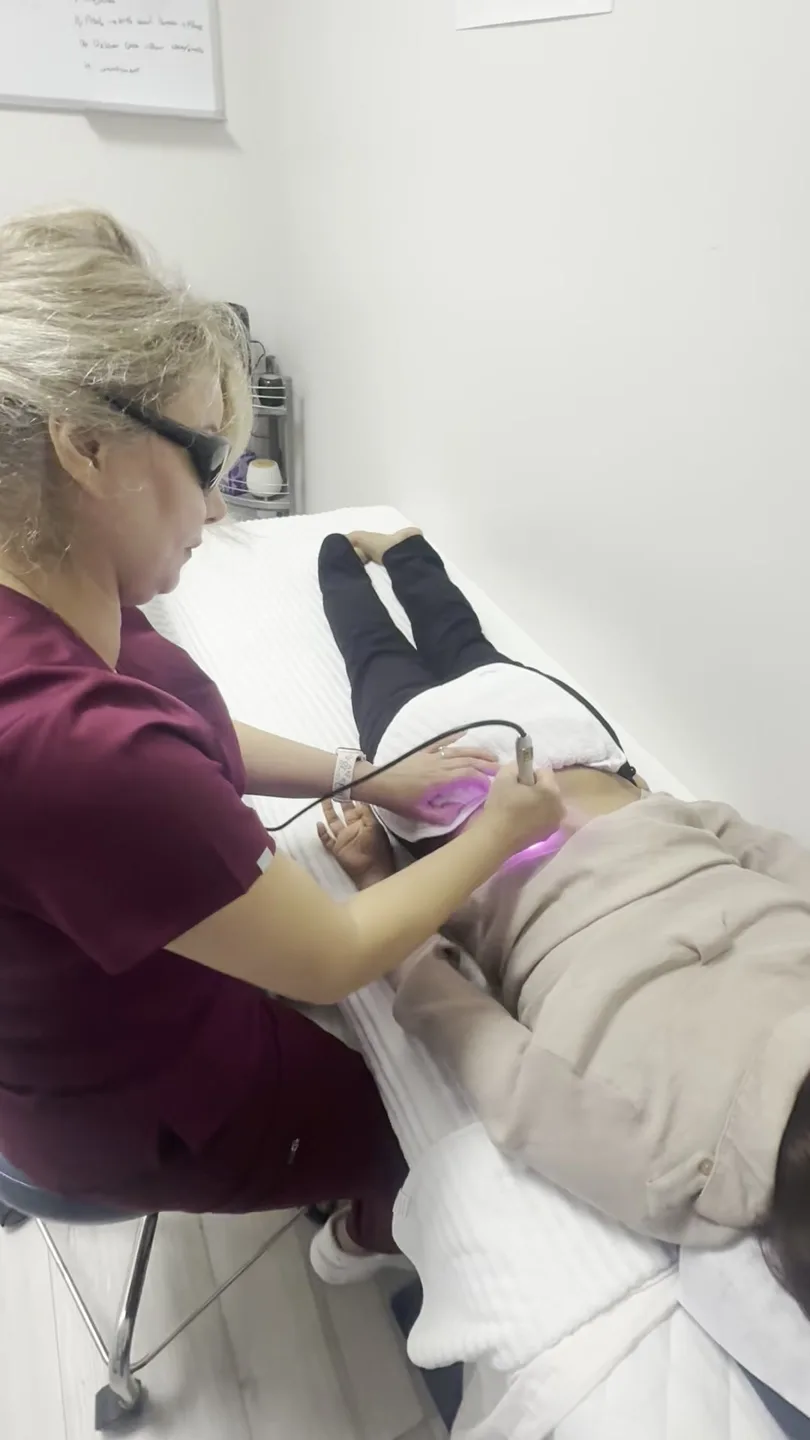 Cold laser therapy session at Divine Healing Chiropractic