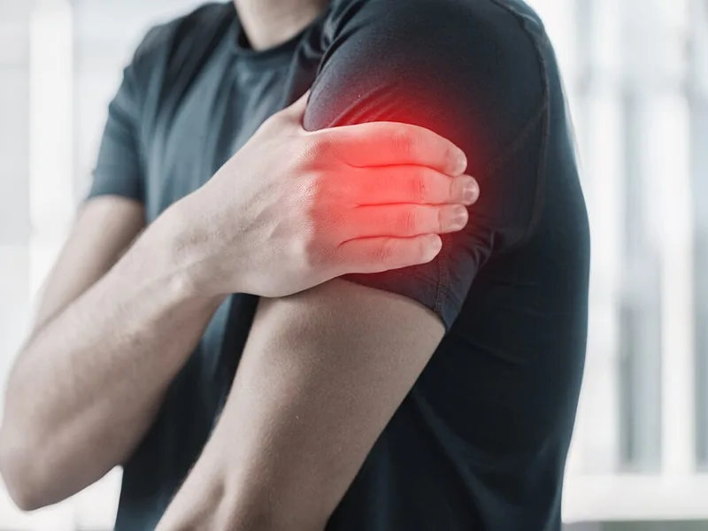 Divine Healing Chiropractic treating arm pain in Laguna Niguel