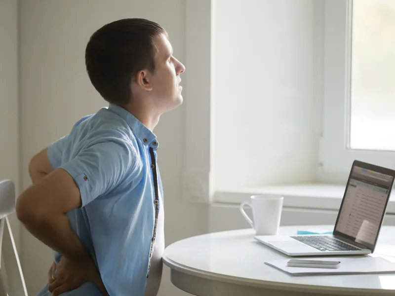 Divine Healing Chiropractic treating back pain in Laguna Niguel