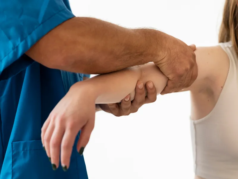 Chiropractic care for elbow pain at Divine Healing Chiropractic in Laguna Niguel